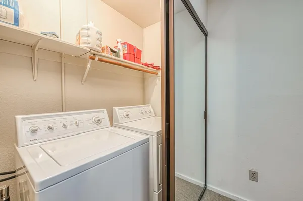 a utility room with dryer and washer