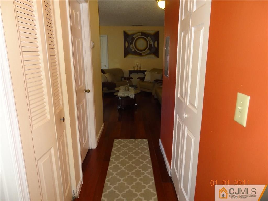 1019 Edpas Road, Unit 1019 New Brunswick, NJ 08901 - Photo 15 of 18 a view of a hallway with a flower pot