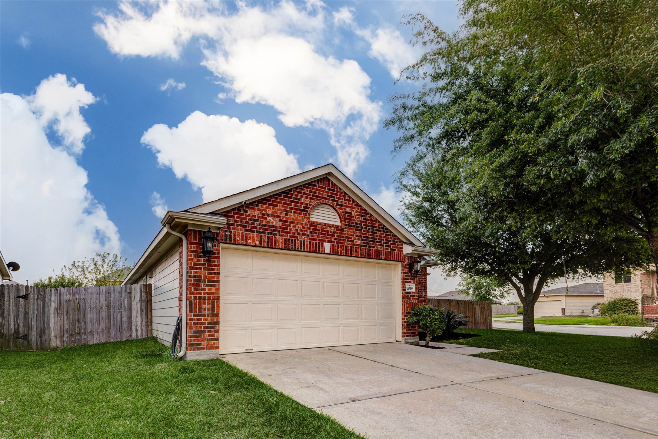7039 Primrose Road Baytown, TX 77521 - Photo 2 of 25 Attractive exterior with attached garage and driveway parking
