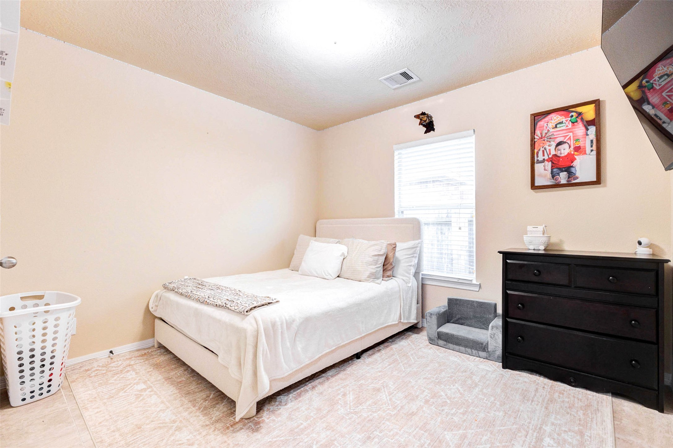 7039 Primrose Road Baytown, TX 77521 - Photo 22 of 25 Additional 3rd bedroom offering flexibility for guests, office, or family