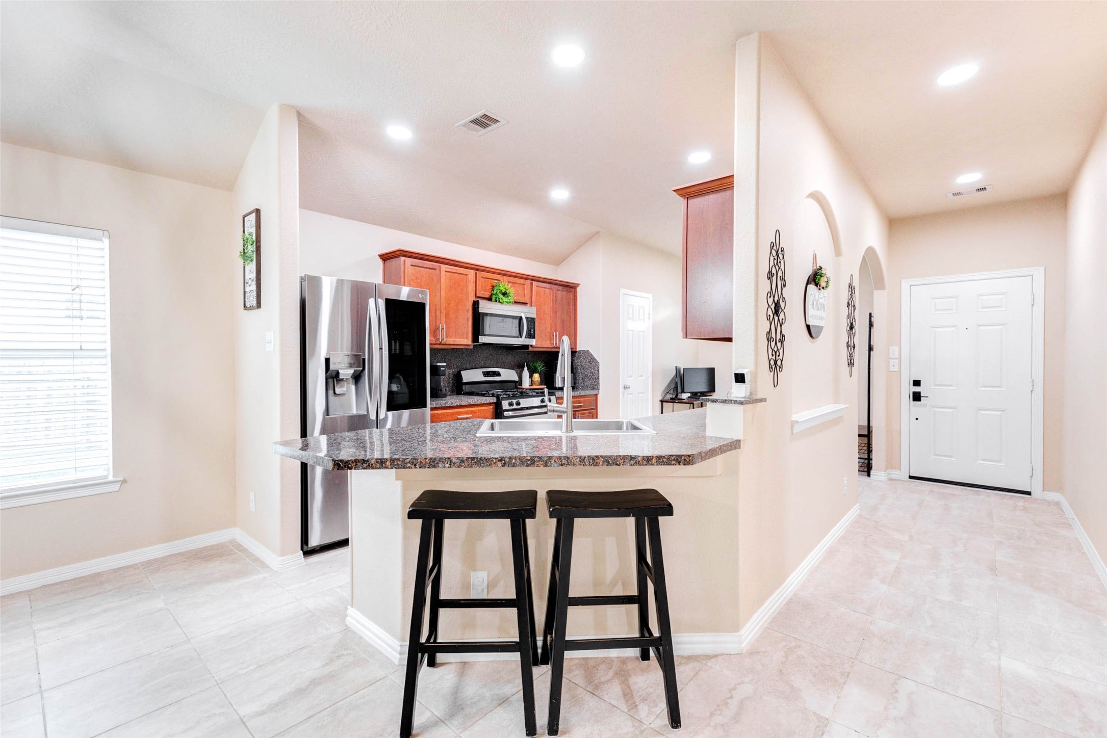7039 Primrose Road Baytown, TX 77521 - Photo 6 of 25 Kitchen and breakfast area designed for easy everyday living