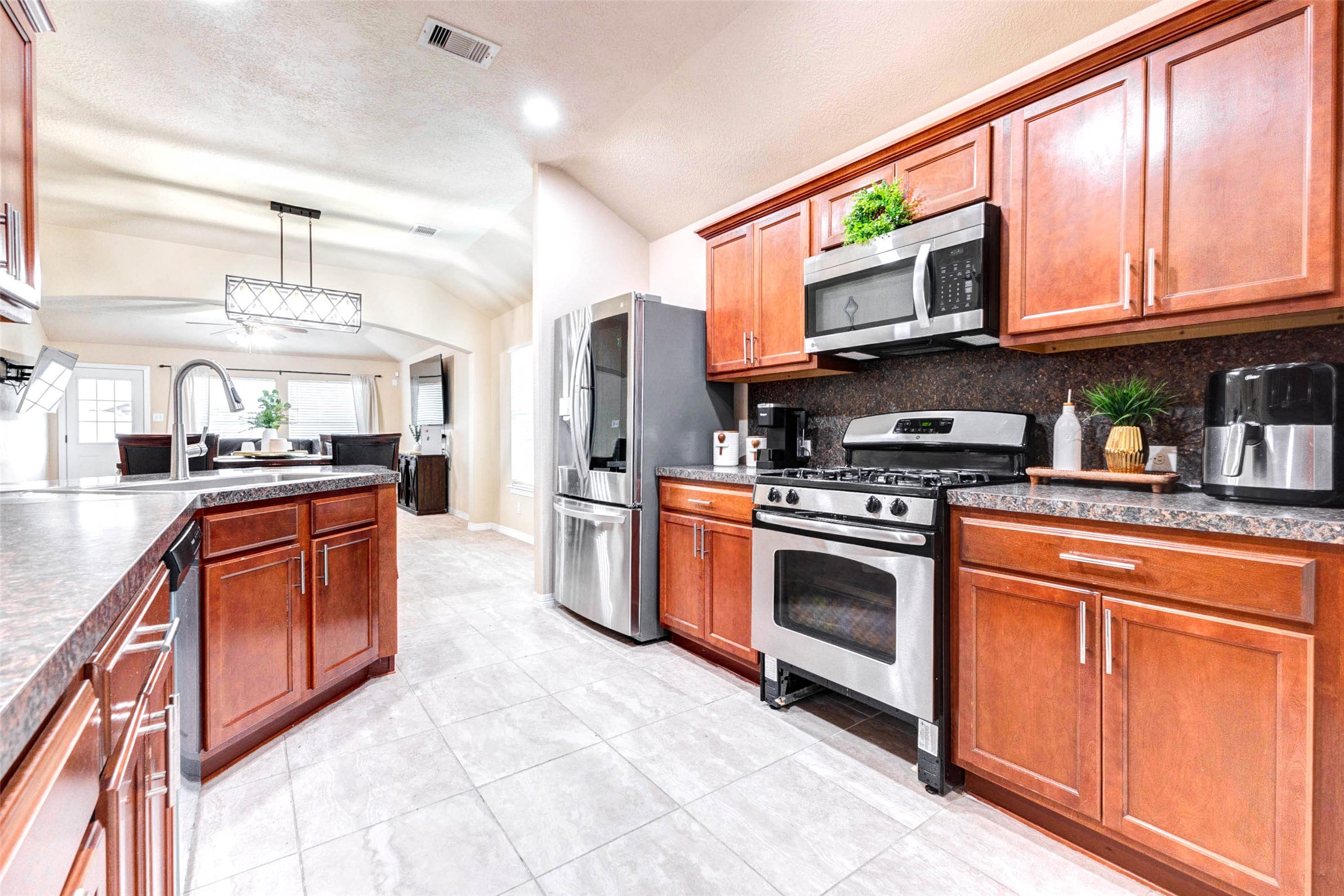 7039 Primrose Road Baytown, TX 77521 - Photo 7 of 25 Spacious kitchen with generous cabinet and counter space