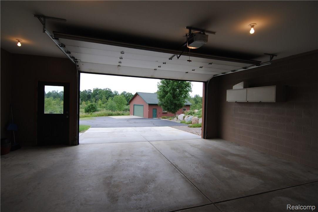 2497 East Clyde Road Howell, MI 48855 - Photo 26 of 95 Full Concrete and Asphalt driveway between garages!