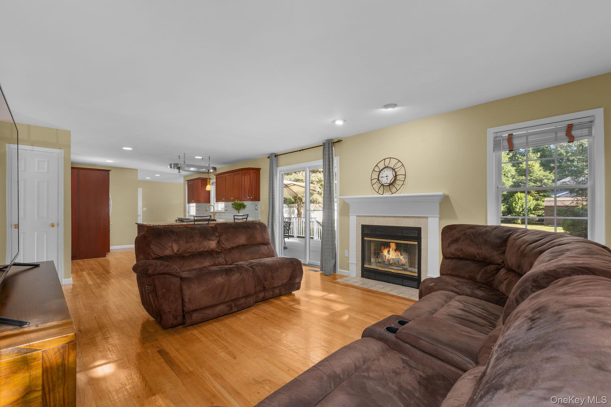 2211 Crompond Road Yorktown Heights, NY 10598 - Photo 7 of 38 a living room with furniture and a fireplace