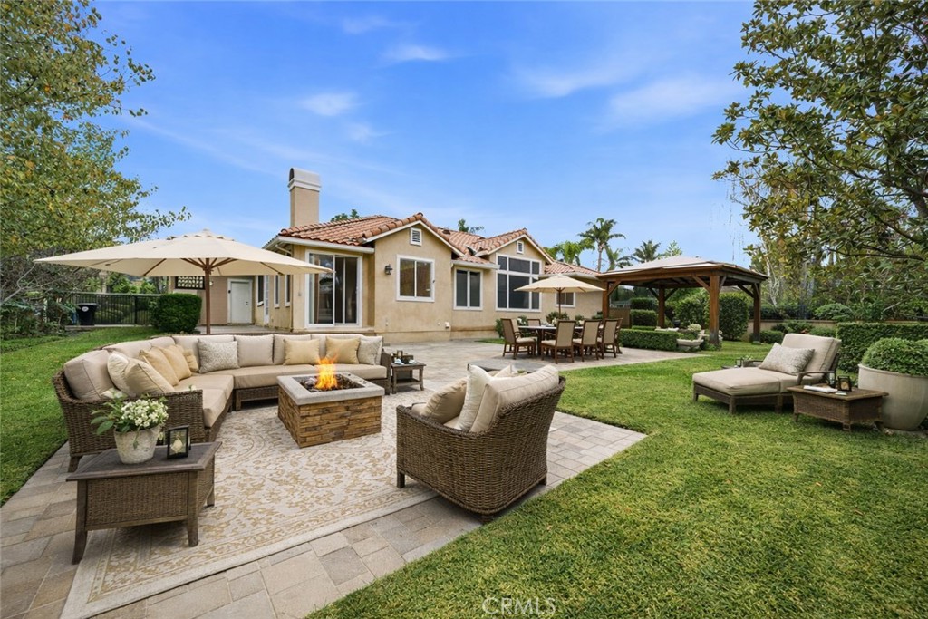 9379 Monarch Court Rancho Cucamonga, CA 91737 - Photo 14 of 19 a front view of a house with garden