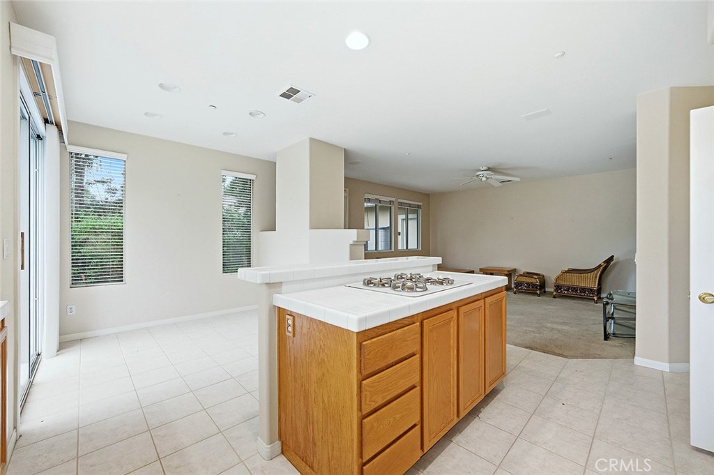9379 Monarch Court Rancho Cucamonga, CA 91737 - Photo 5 of 19 a kitchen with a stove and a refrigerator