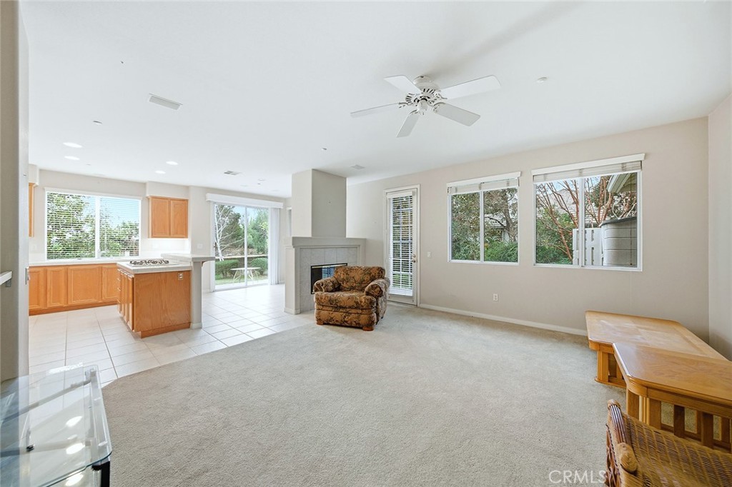 9379 Monarch Court Rancho Cucamonga, CA 91737 - Photo 6 of 19 a large white room with a large window and a table