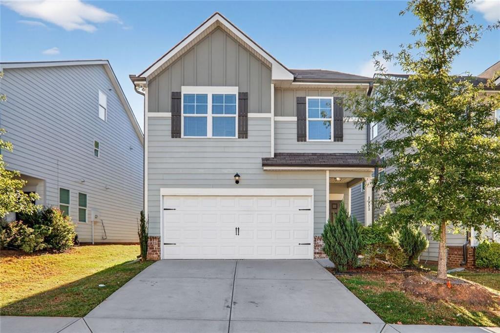 1553 Spring Hollow Way Stone Mountain, GA 30083 - Photo 1 of 25 a front view of house with yard