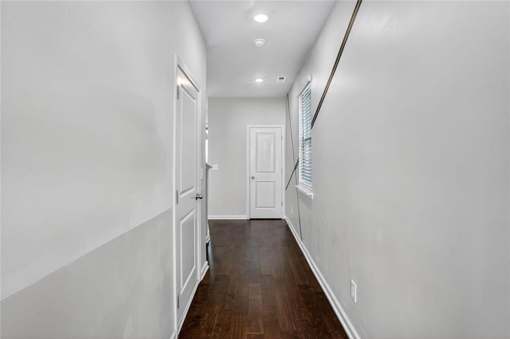 1553 Spring Hollow Way Stone Mountain, GA 30083 - Photo 2 of 25 a view of hallway with wooden floor