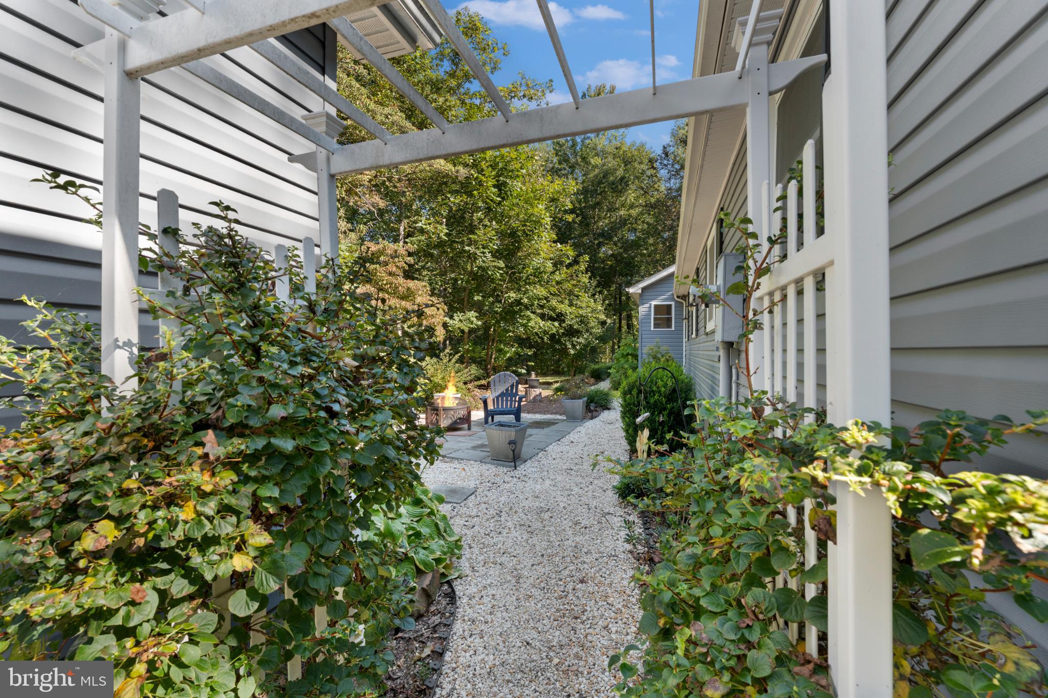 8572 Monumental Mills Road Rixeyville, VA 22737 - Photo 59 of 70 Serene garden path invites tranquil moments.