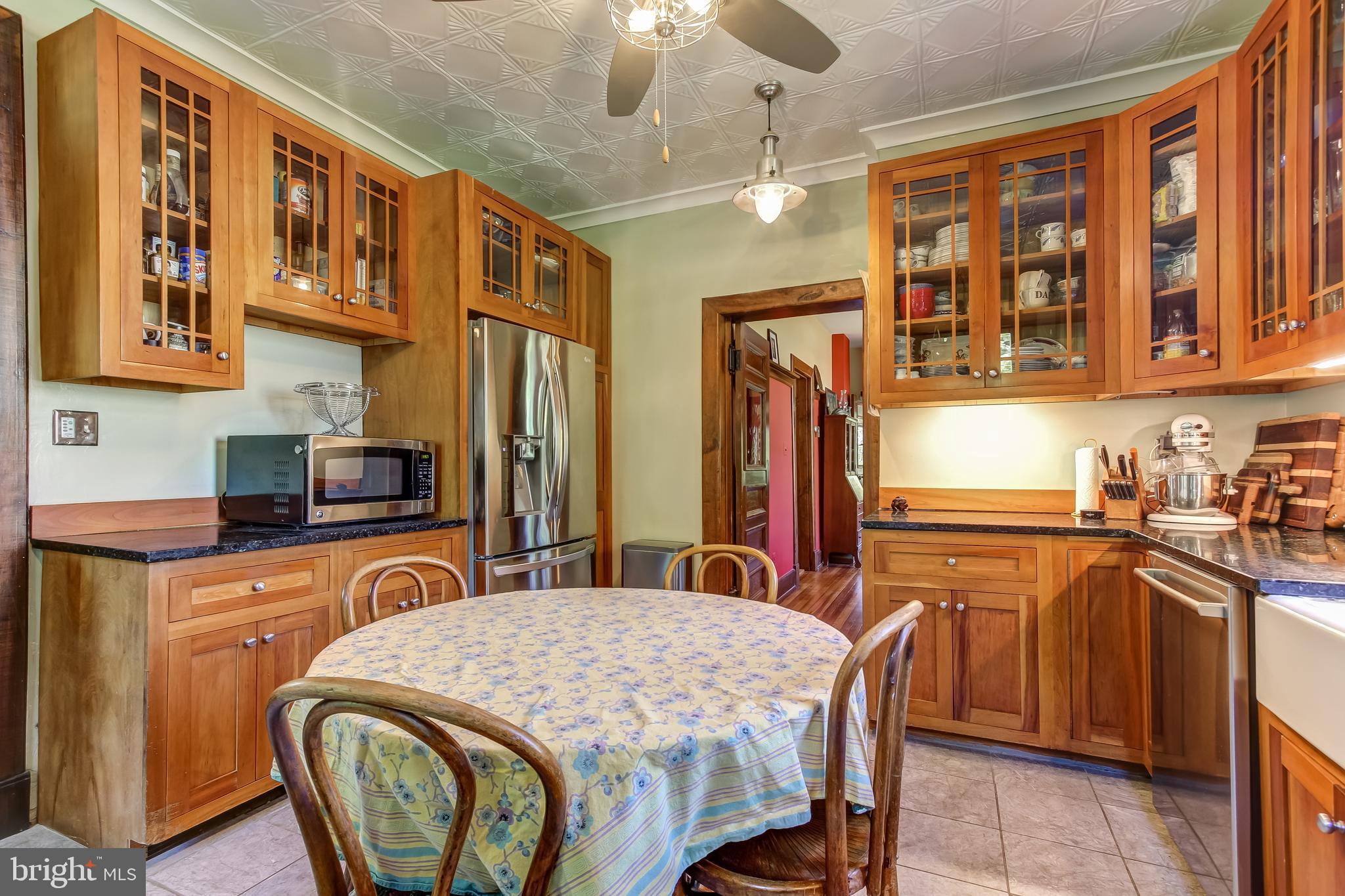 609 Ritchie Avenue Silver Spring, MD 20910 - Photo 17 of 36 with cherry cabinetry, stainless appliances,