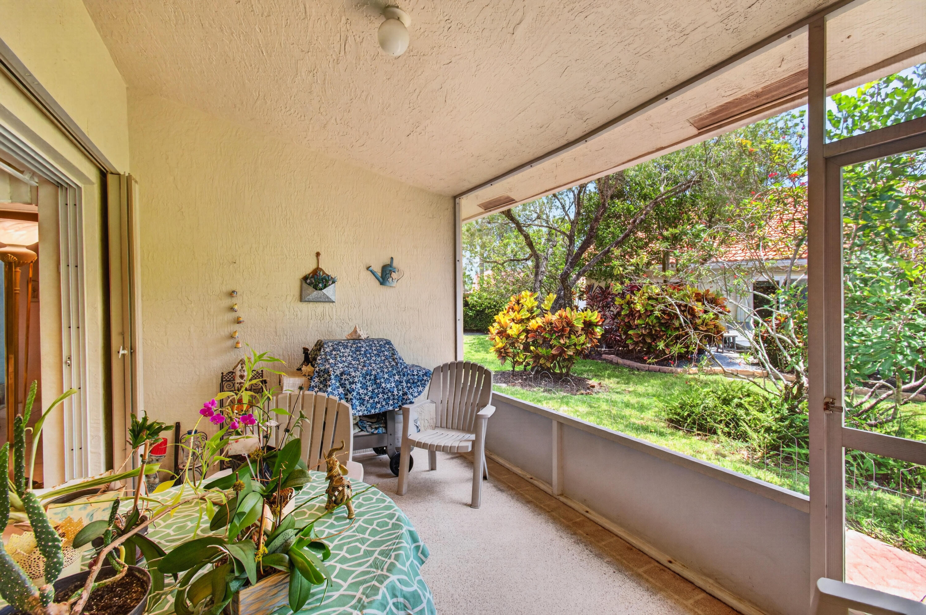 6088 Caladium Road Delray Beach, FL 33484 - Photo 36 of 59 Roofed & Screened Patio