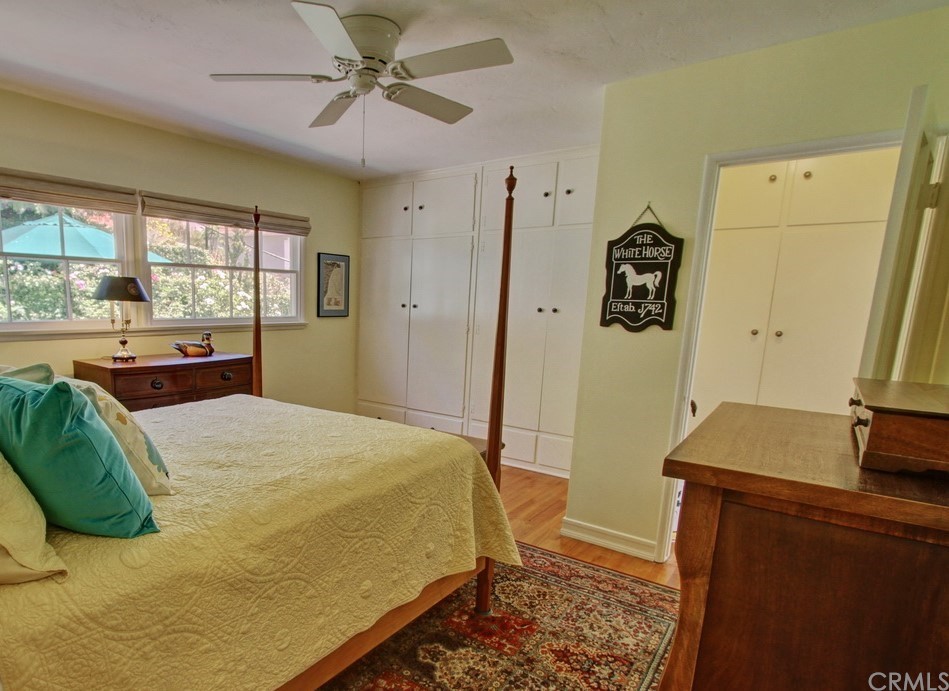 12419 Honolulu Terrace Whittier, CA 90601 - Photo 14 of 59 a bedroom with a bed and a table in it