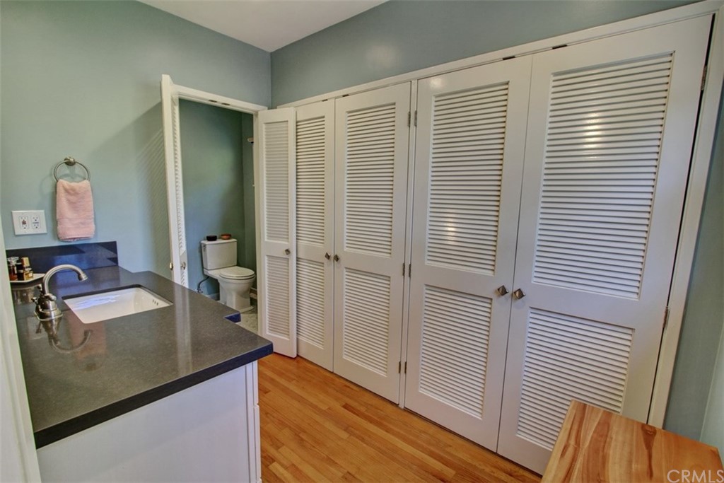 12419 Honolulu Terrace Whittier, CA 90601 - Photo 22 of 59 a bathroom with a sink a toilet and shower