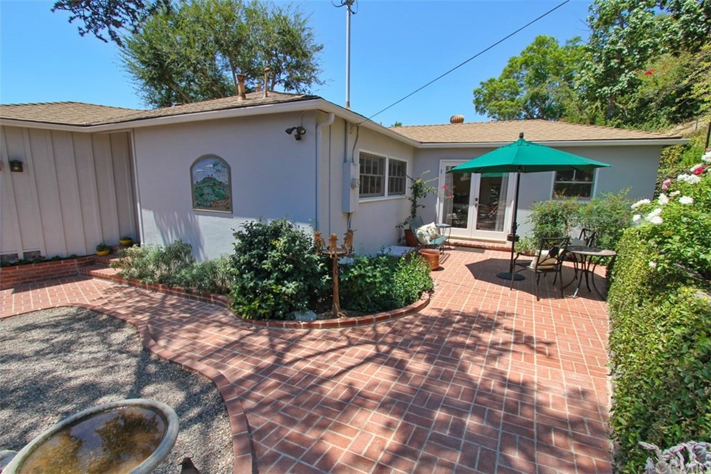 12419 Honolulu Terrace Whittier, CA 90601 - Photo 31 of 59 a view of a house with backyard and sitting area
