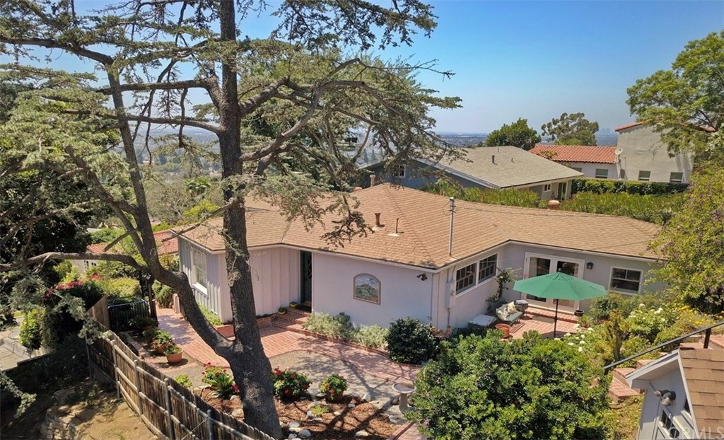 12419 Honolulu Terrace Whittier, CA 90601 - Photo 33 of 59 front view of a house with a yard