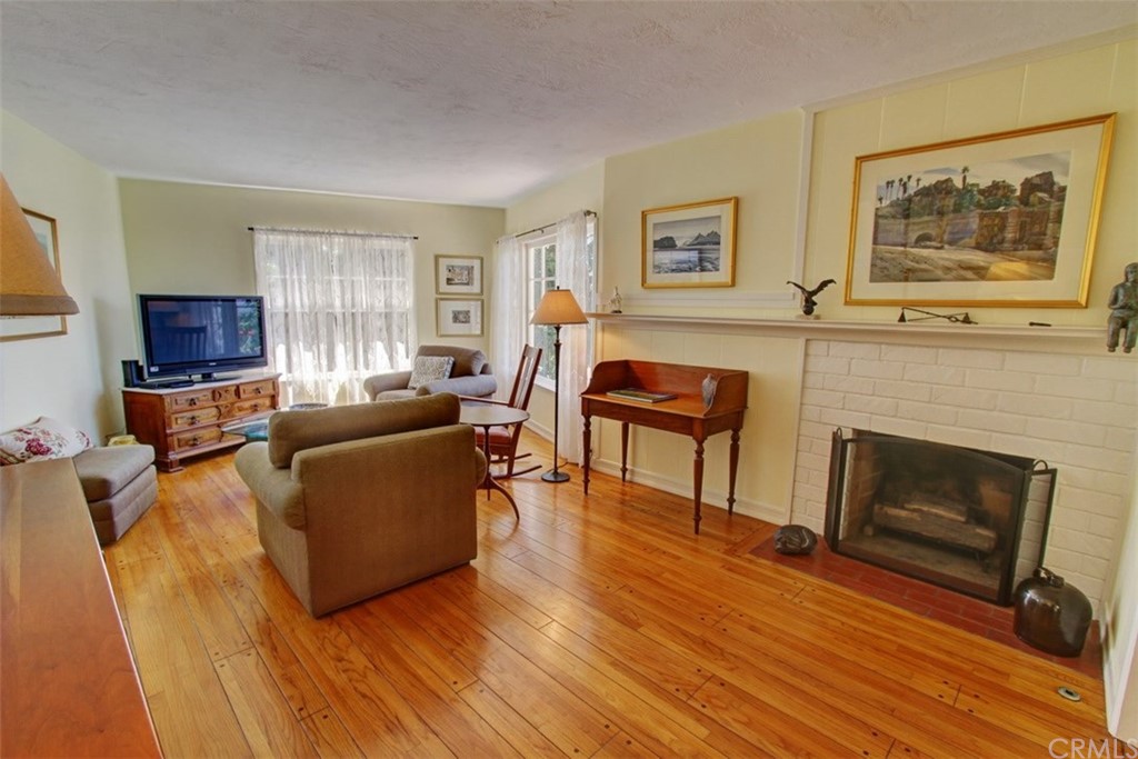 12419 Honolulu Terrace Whittier, CA 90601 - Photo 5 of 59 a living room with furniture and a fireplace
