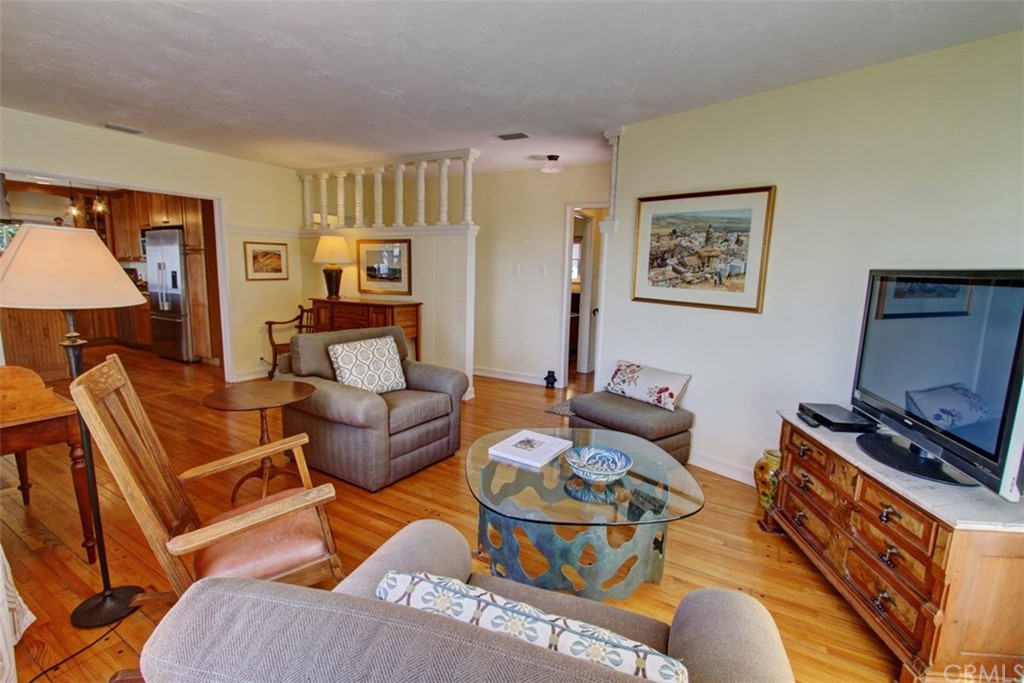 12419 Honolulu Terrace Whittier, CA 90601 - Photo 6 of 59 a living room with furniture and a flat screen tv