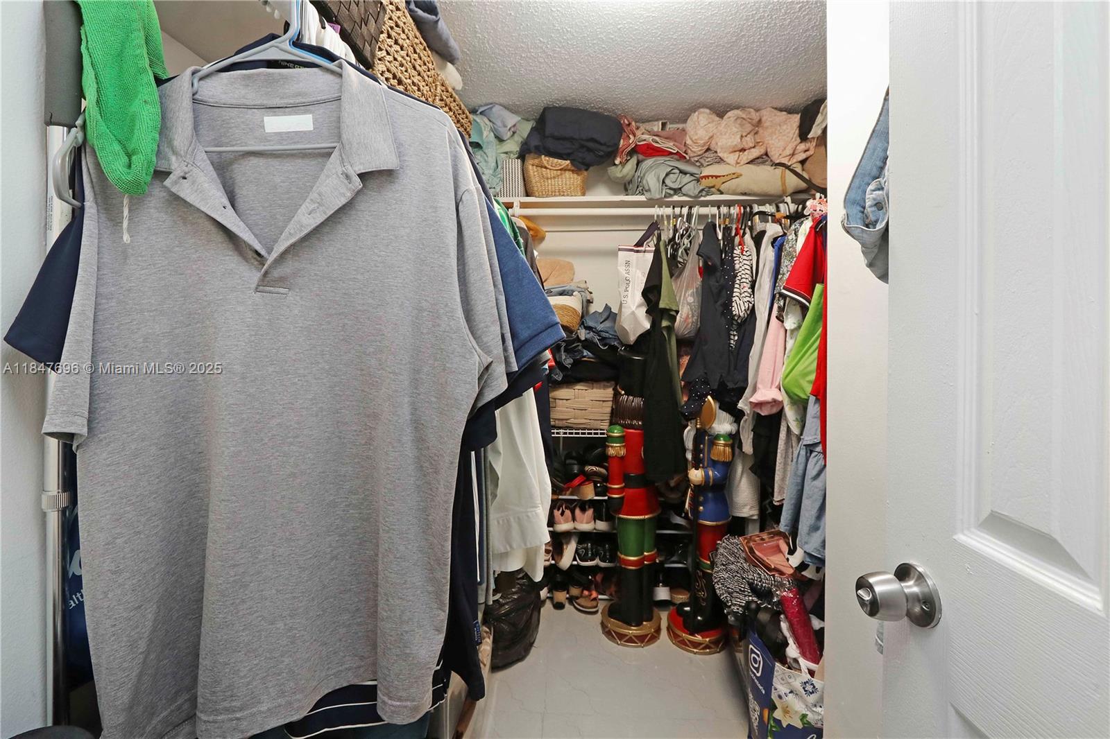 9917 West Okeechobee Road, Unit 3303 Hialeah Gardens, FL 33016 - Photo 14 of 26 a view of a storage and utility room