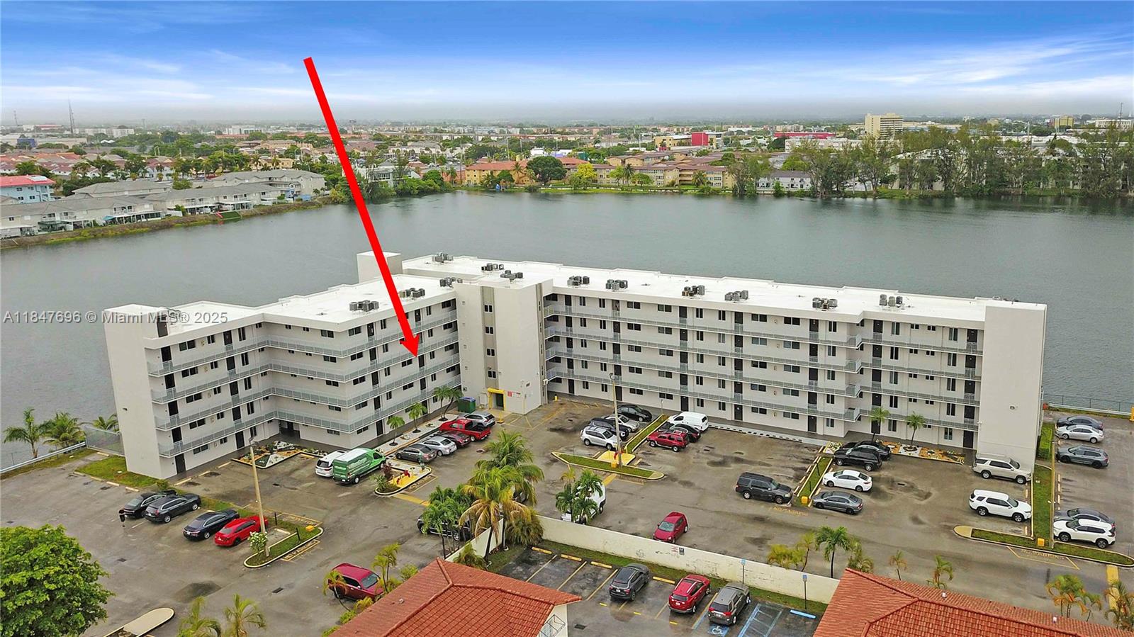 9917 West Okeechobee Road, Unit 3303 Hialeah Gardens, FL 33016 - Photo 24 of 26 an ocean view with beach