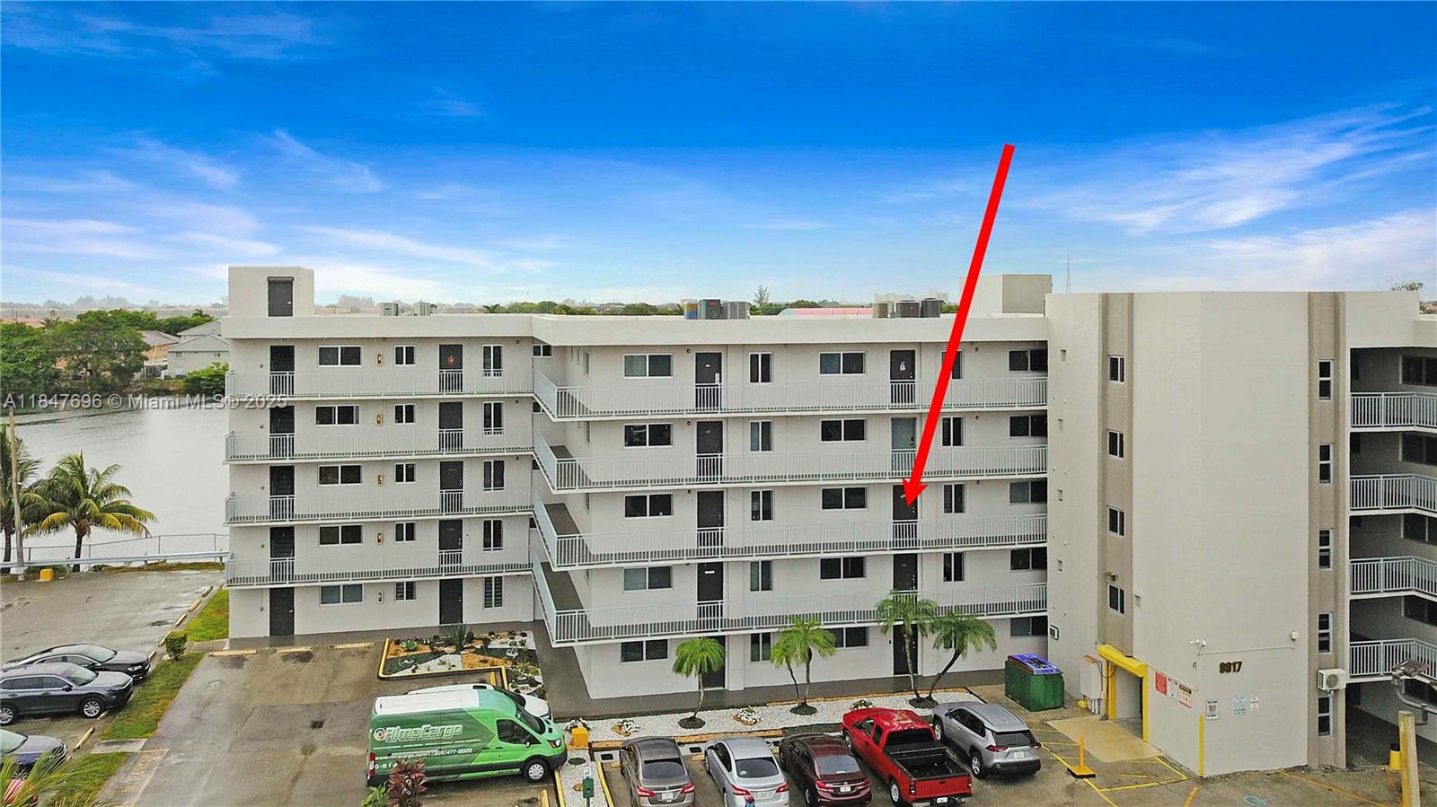 9917 West Okeechobee Road, Unit 3303 Hialeah Gardens, FL 33016 - Photo 26 of 26 a city view with tall buildings