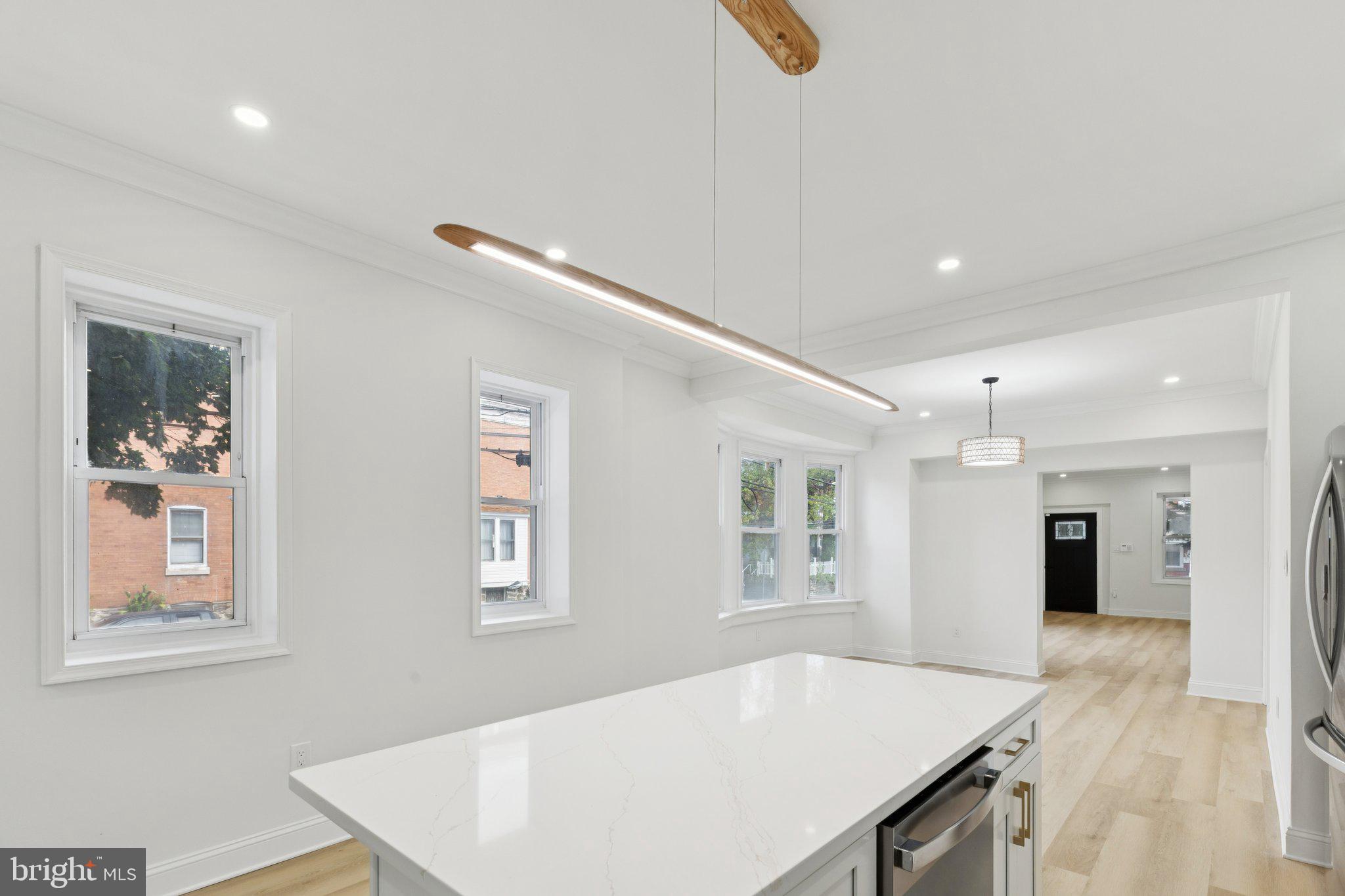 137 Manheim Street Philadelphia, PA 19144 - Photo 16 of 81 a view of kitchen with furniture and wooden floor