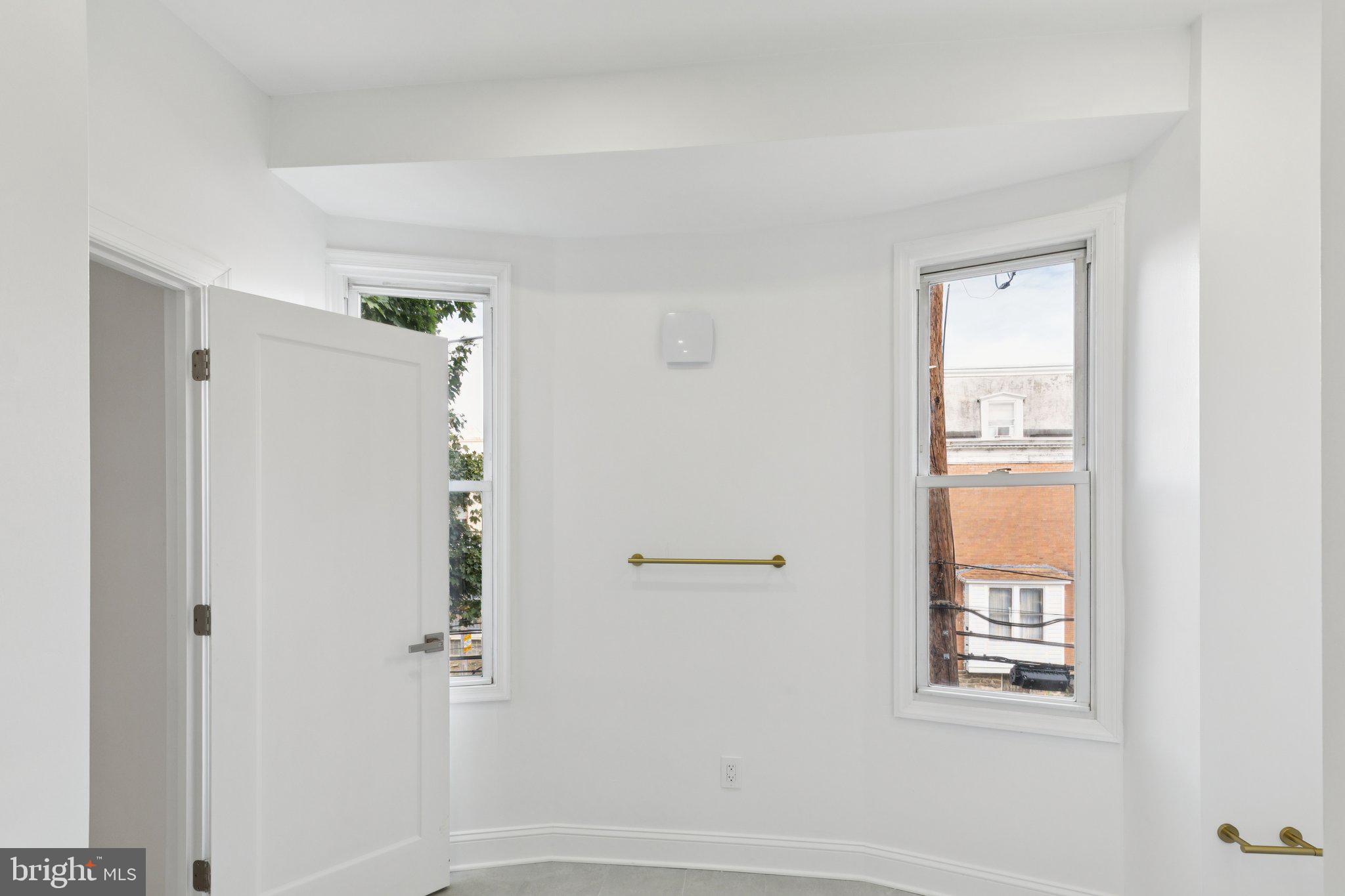 137 Manheim Street Philadelphia, PA 19144 - Photo 40 of 81 a bathroom with a window and a shower