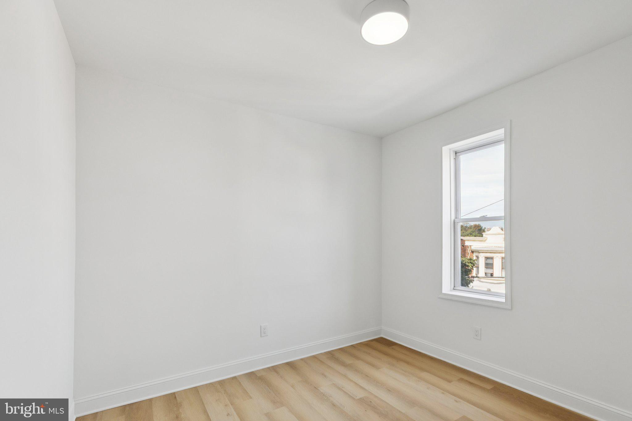 137 Manheim Street Philadelphia, PA 19144 - Photo 52 of 81 an empty room with a window