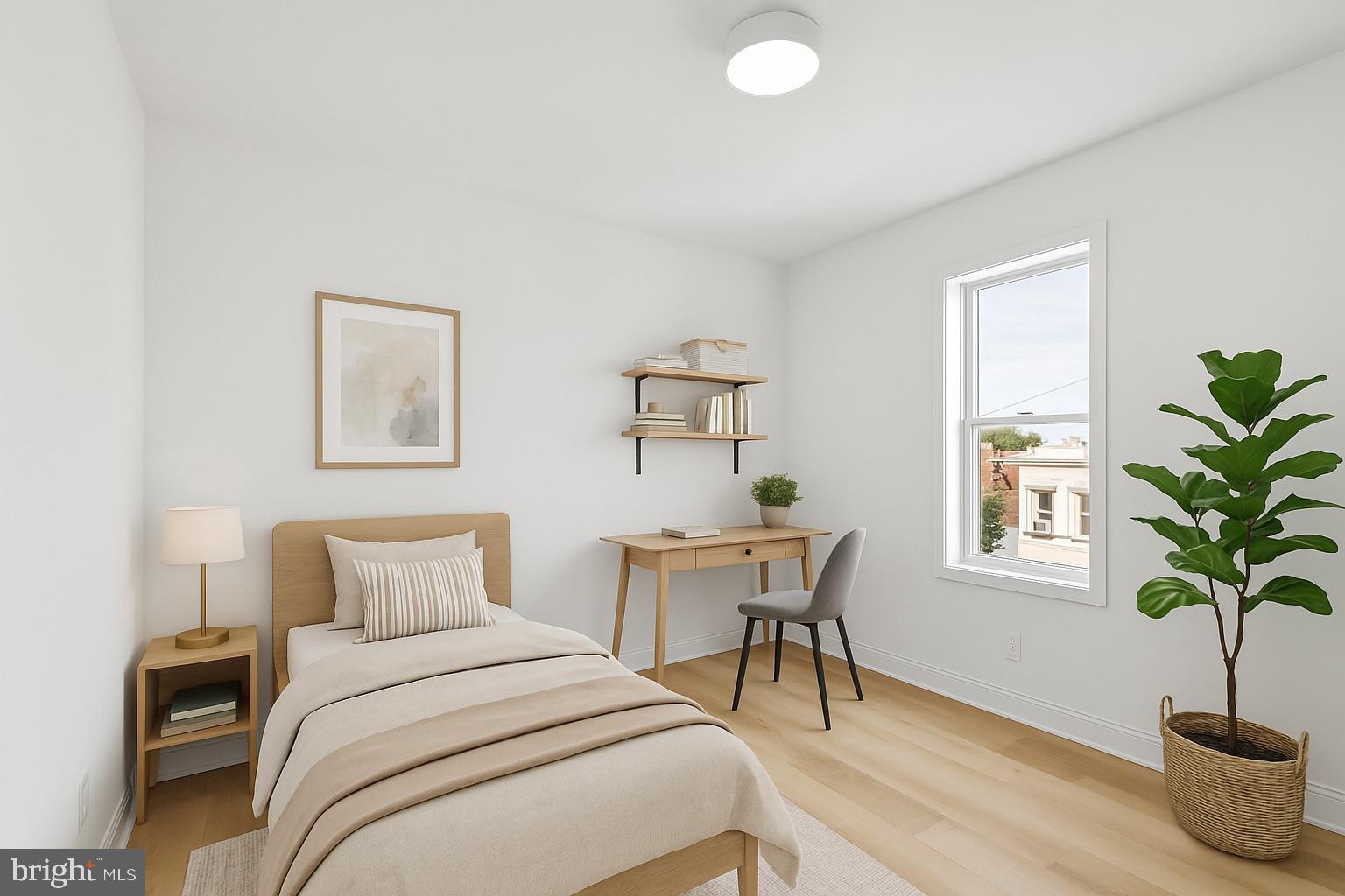 137 Manheim Street Philadelphia, PA 19144 - Photo 53 of 81 a bedroom with a bed and a potted plant