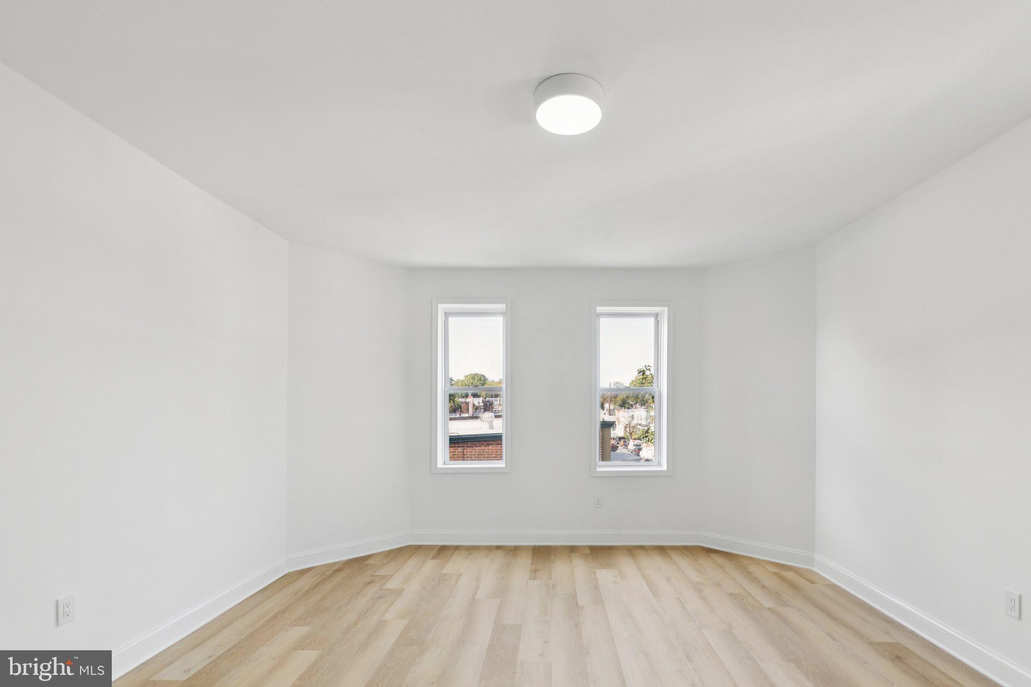 137 Manheim Street Philadelphia, PA 19144 - Photo 60 of 81 an empty room with a window