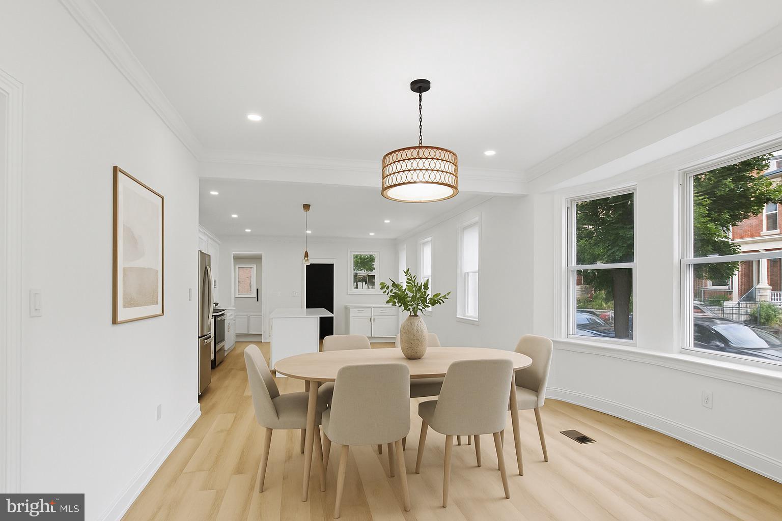 137 Manheim Street Philadelphia, PA 19144 - Photo 7 of 81 a view of a dining room with furniture window and wooden floor