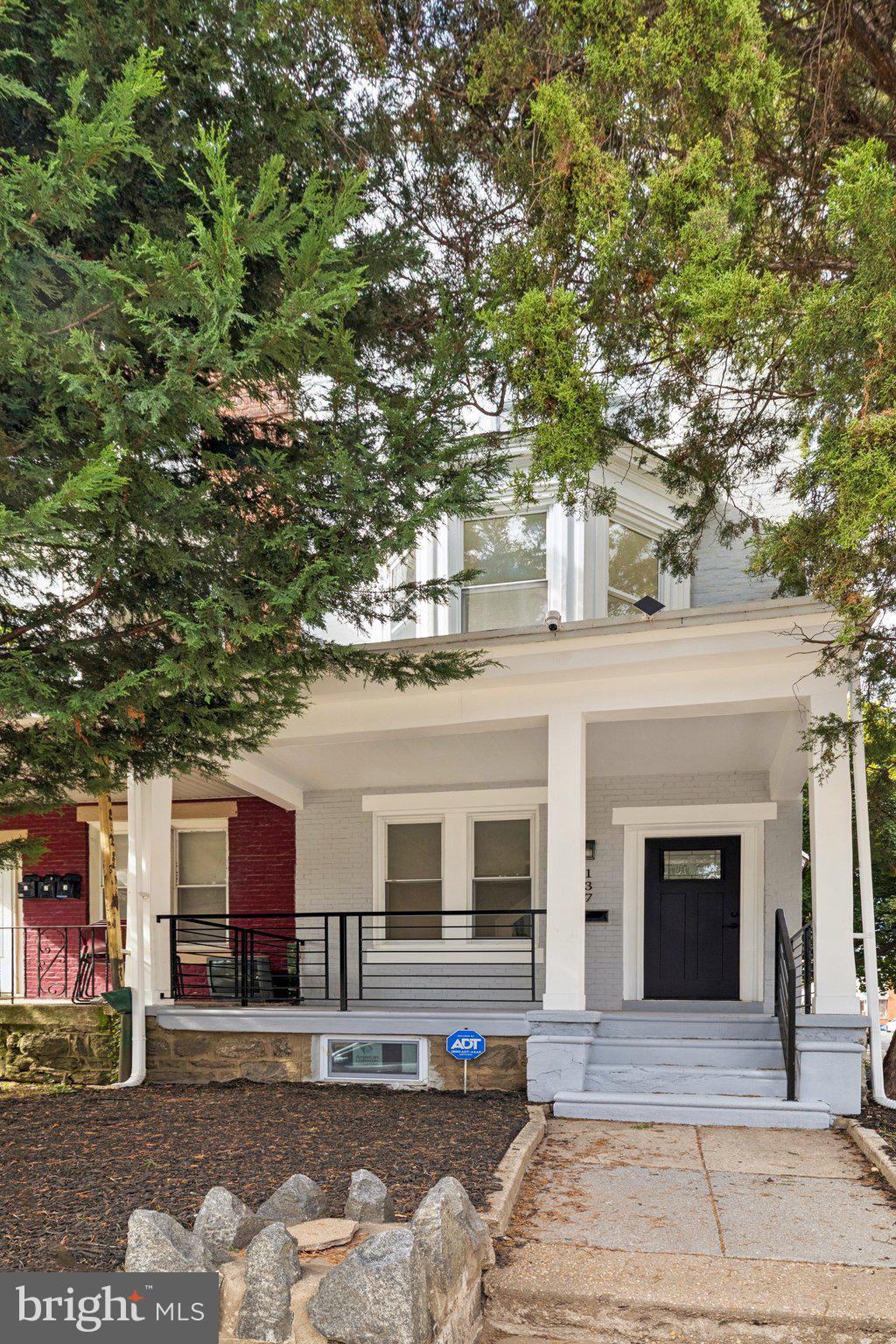 137 Manheim Street Philadelphia, PA 19144 - Photo 81 of 81 a building with trees in front of it