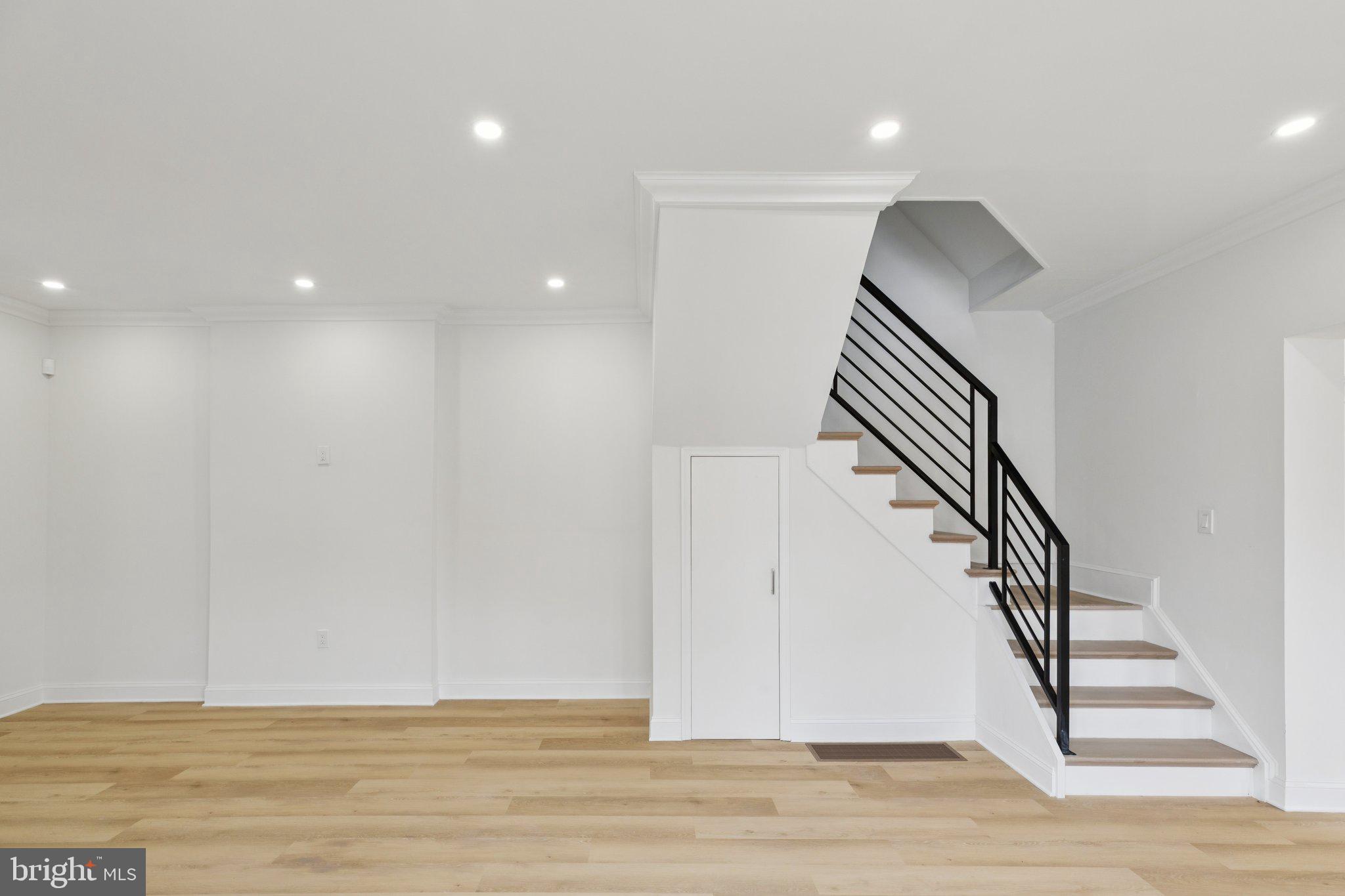 137 Manheim Street Philadelphia, PA 19144 - Photo 9 of 81 a view of entryway and hall with wooden floor