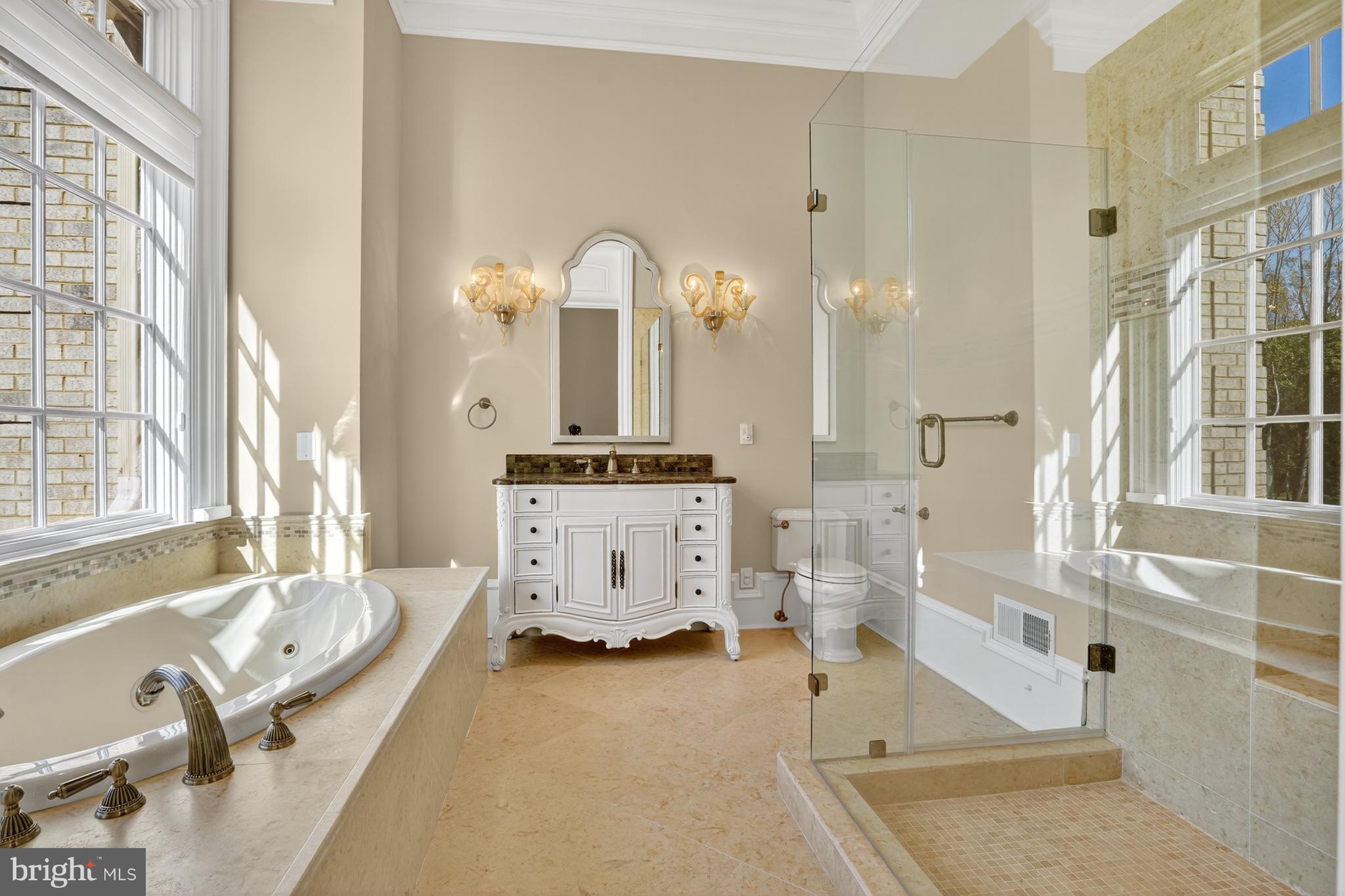 1174 Old Tolson Mill Road McLean, VA 22102 - Photo 15 of 35 a bathroom with a tub sink and mirror