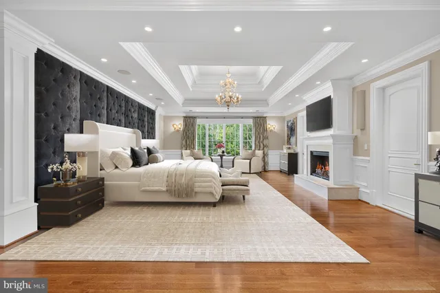 a living room with furniture fireplace and flat screen tv