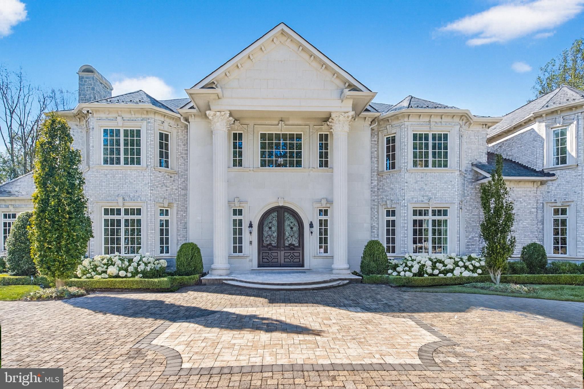 1174 Old Tolson Mill Road McLean, VA 22102 - Photo 2 of 35 a view of a house with a yard and plants