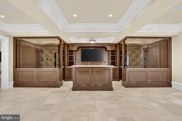 a living room with a washer and dryer