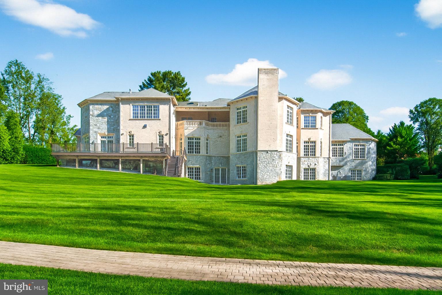 1174 Old Tolson Mill Road McLean, VA 22102 - Photo 31 of 35 a front view of a house with a yard