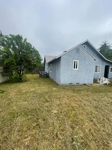 a house view with a garden space