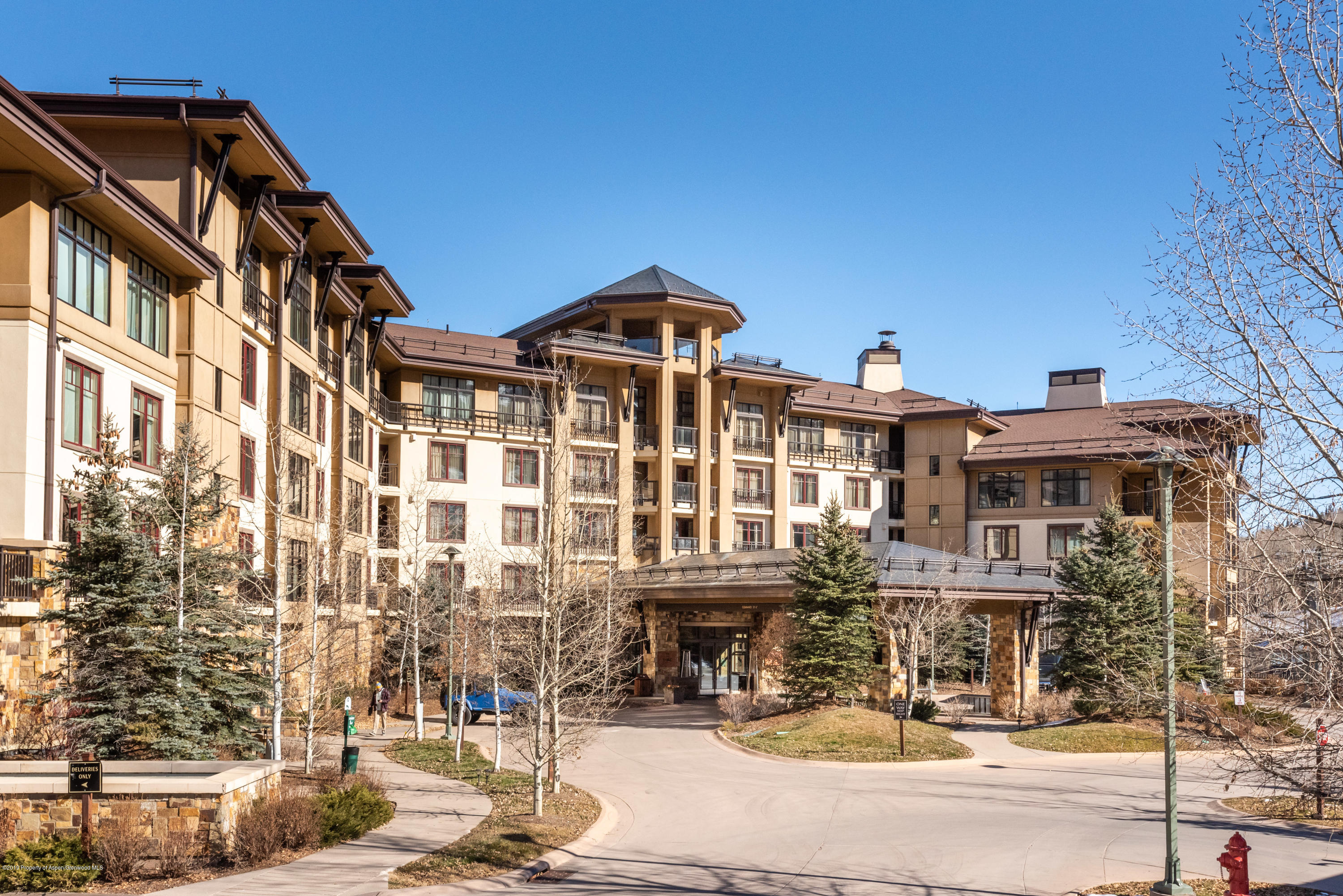 130 Wood Road, Unit 736 Snowmass Village, CO 81615 - Photo 11 of 12 a front view of a building with street view