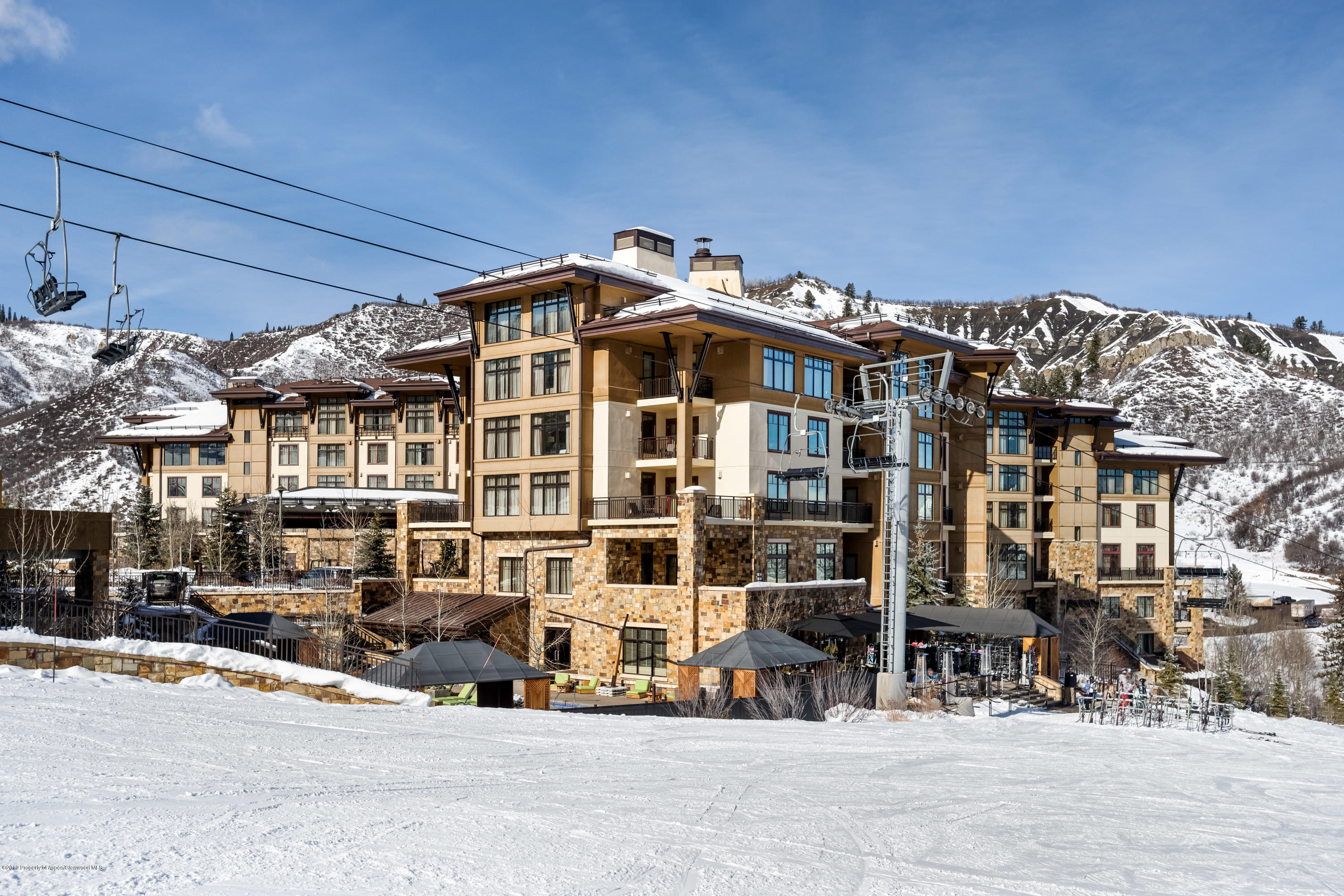 130 Wood Road, Unit 736 Snowmass Village, CO 81615 - Photo 12 of 12 a front view of a building with street view