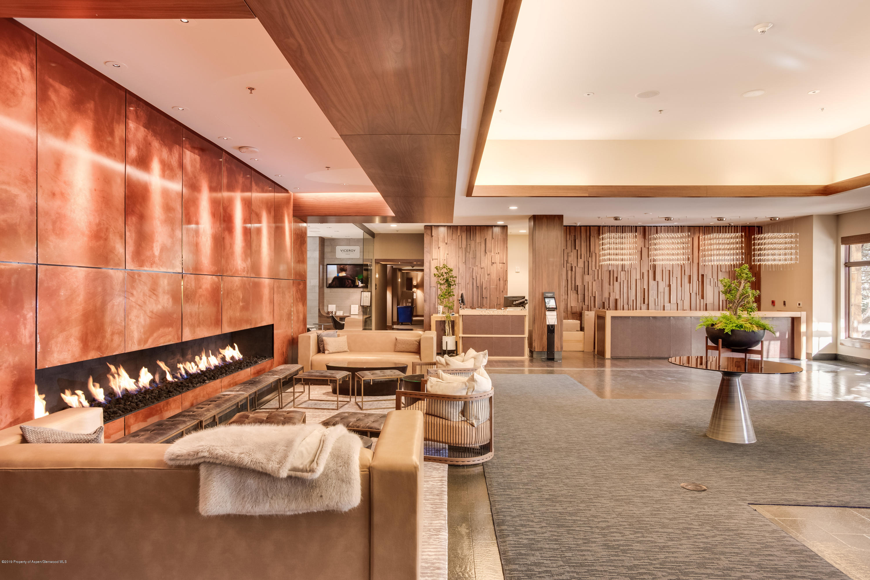 130 Wood Road, Unit 736 Snowmass Village, CO 81615 - Photo 5 of 12 a living room with furniture