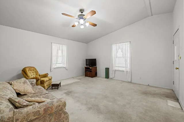 a view of a livingroom with furniture