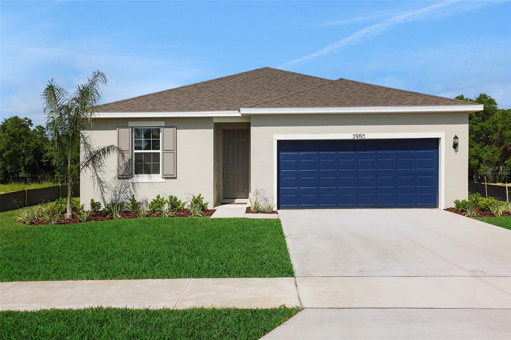 2950 Supermarine Road Tavares, FL 32778 - Photo 1 of 1 a front view of a house with a yard