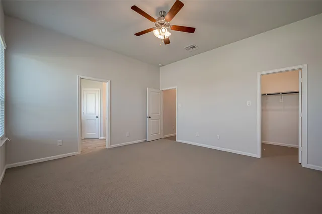 a bathroom with a double vanity sink and mirror