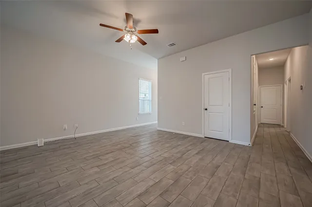 a view of a livingroom with a hardwood floor
