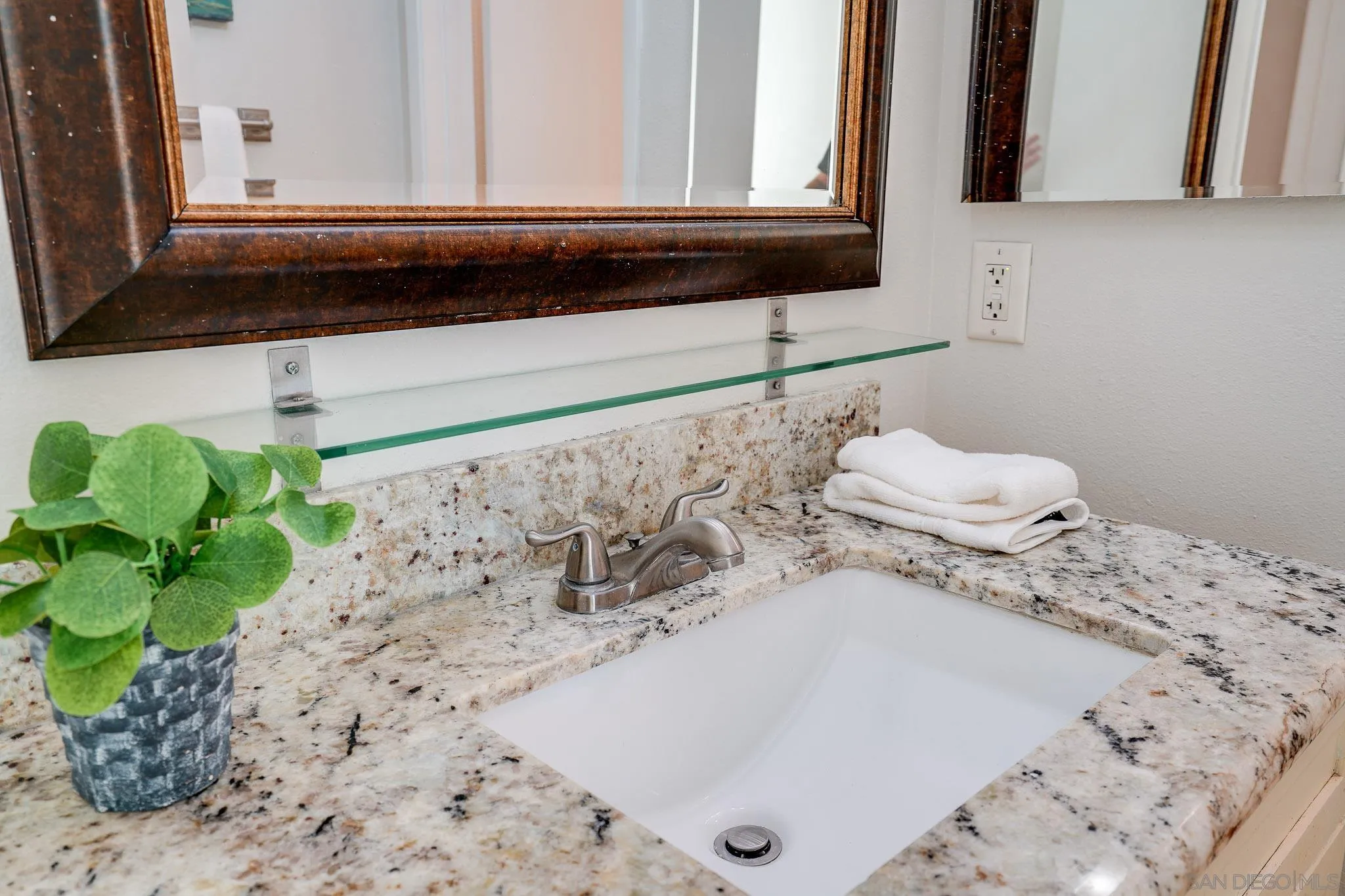 6069 Rancho Mission Road, Unit 201 San Diego, CA 92108 - Photo 23 of 43 a close view of a sink in a kitchen