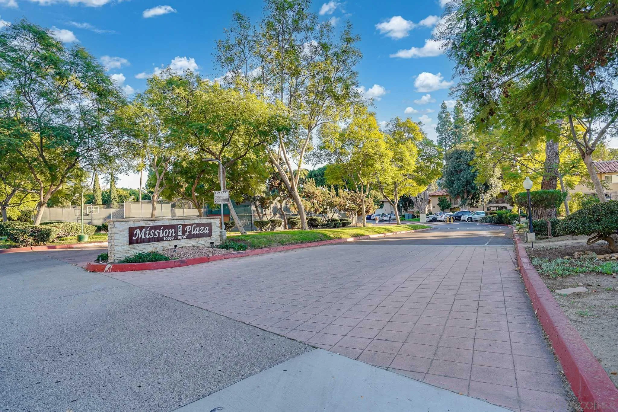 6069 Rancho Mission Road, Unit 201 San Diego, CA 92108 - Photo 36 of 43 a view of road with trees