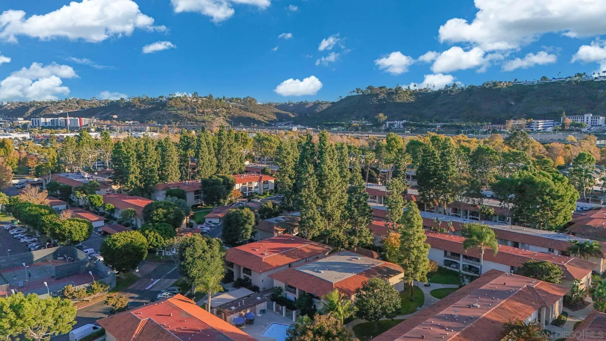 6069 Rancho Mission Road, Unit 201 San Diego, CA 92108 - Photo 42 of 43 a view of a city with lots of trees