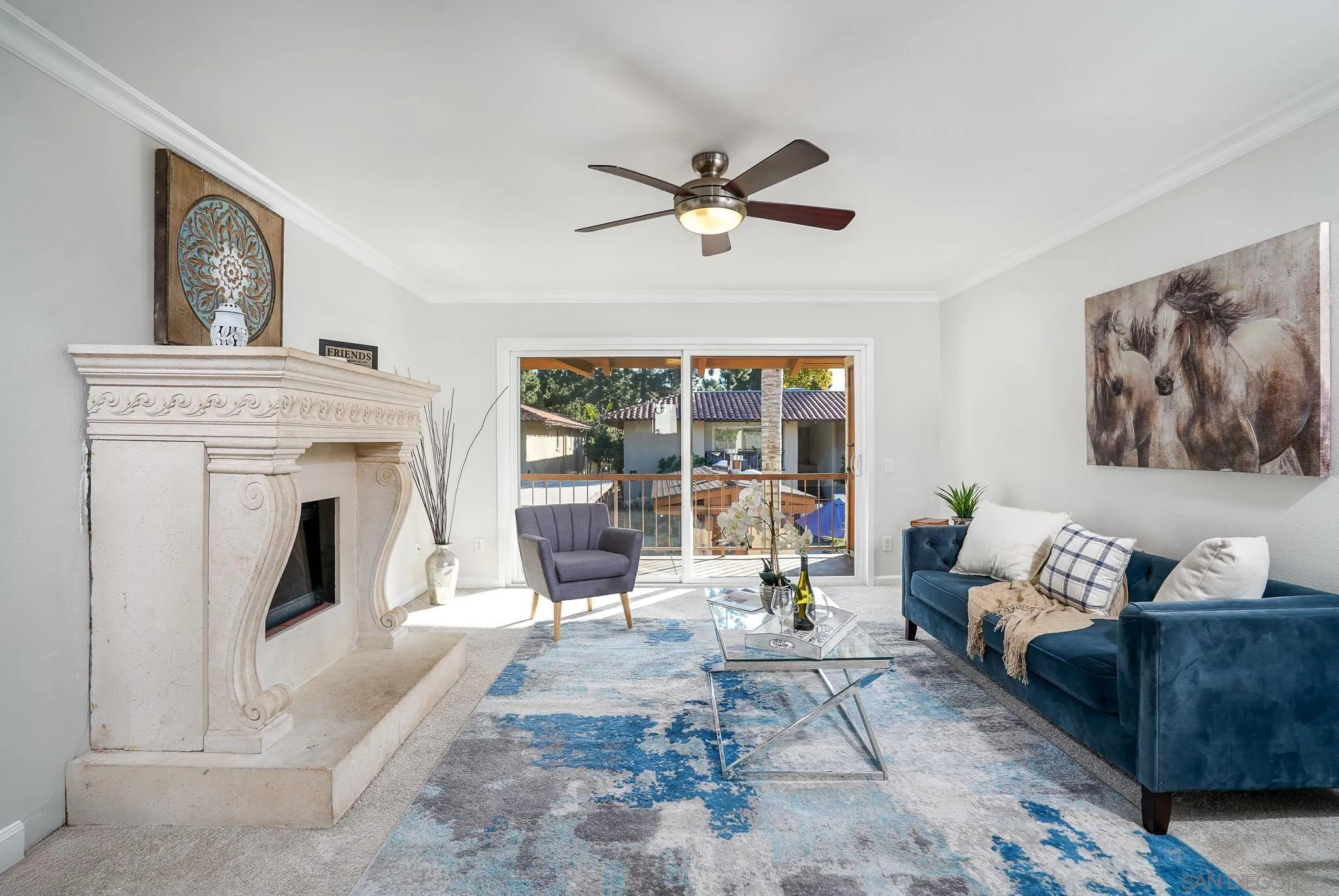 6069 Rancho Mission Road, Unit 201 San Diego, CA 92108 - Photo 6 of 43 a living room with furniture and a fireplace